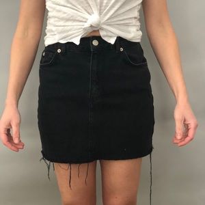 Black denim skirt